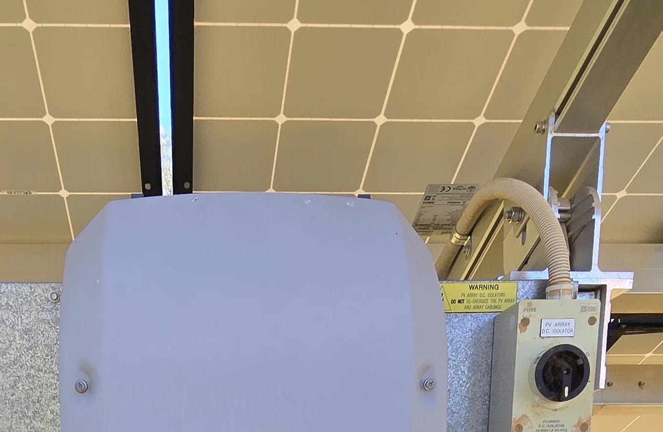 Close-up of the PV array DC isolator and neat conduit run on a Sawtell Contracting NT solar installation