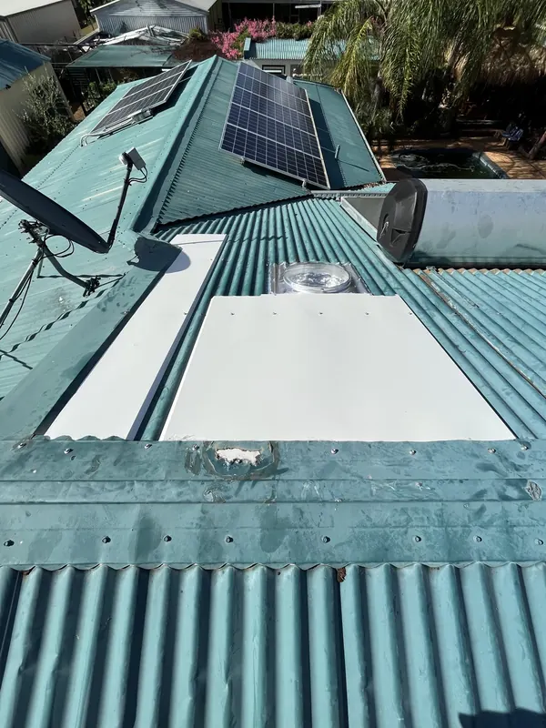 The roof after the repair, new sheet metal and skylight